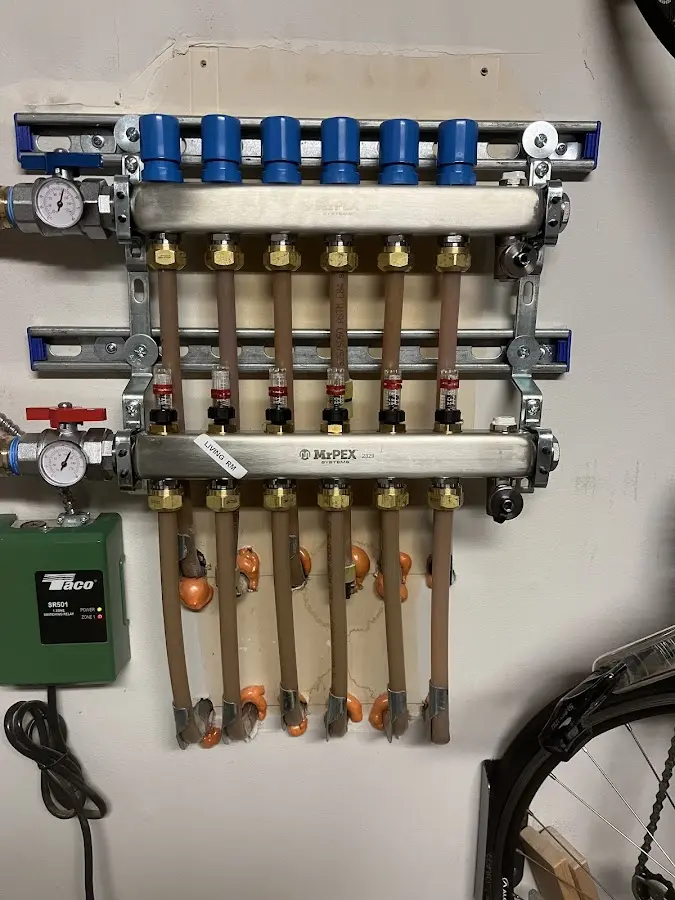 Plumber performing Water Heater Repair at a residential property in Villas